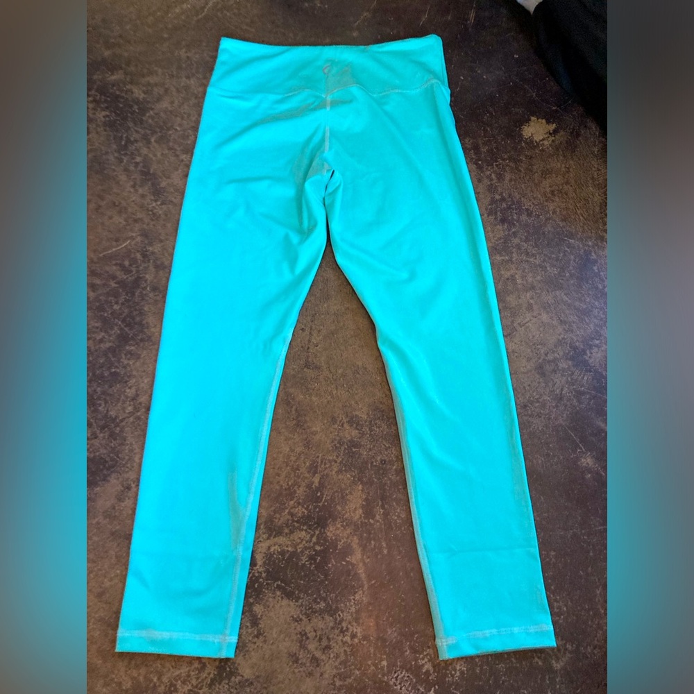 Like new ZYIA turquoise light and tight 7/8 - size 8-10